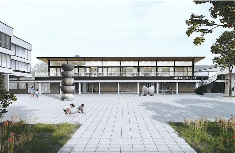 Aufgestockte Turnhalle vom Pausenplatz her